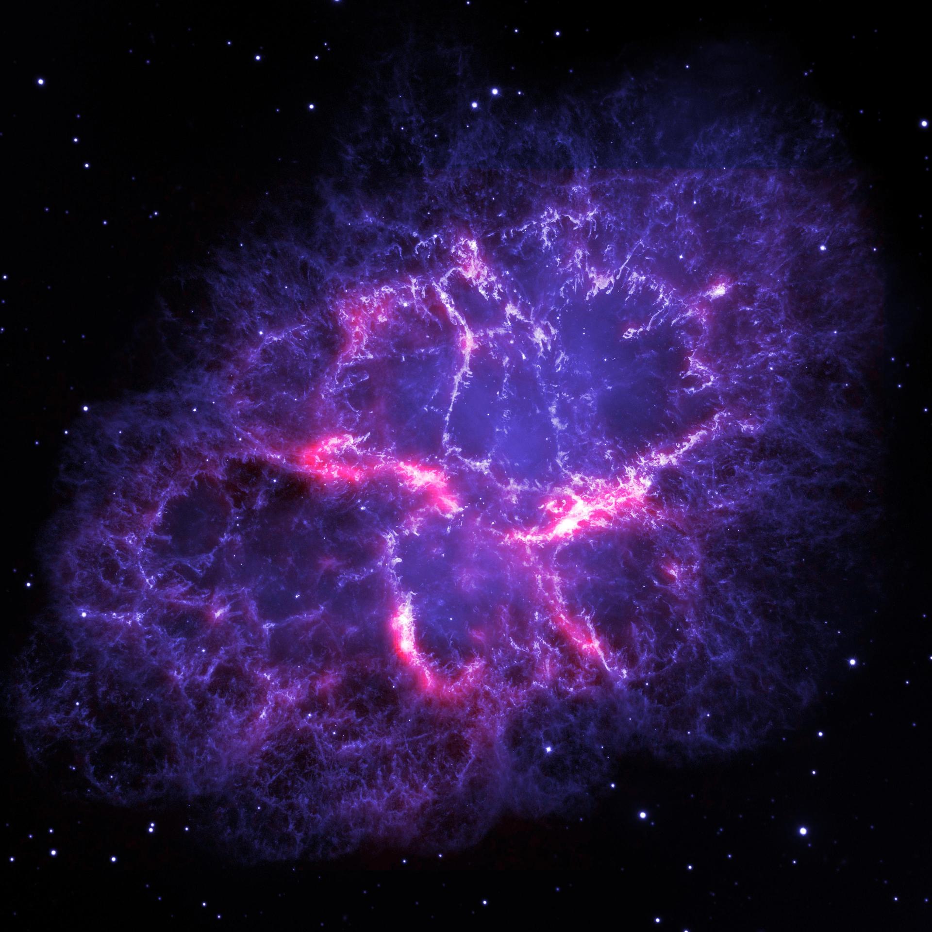 Crab Nebula (M1) — supernova remnant imaged by Herschel and Hubble Space Telescopes